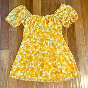 Orange summer dress with sheer puff sleeves